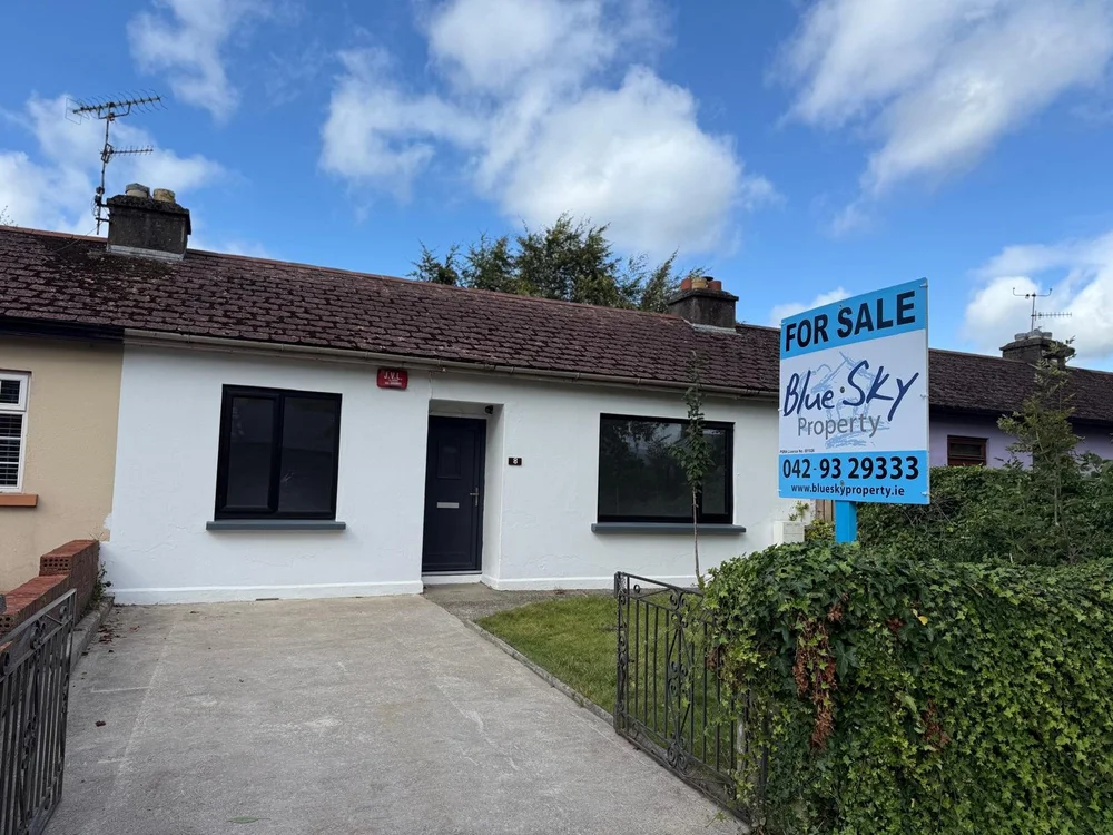 Blue Sky Property signage seen outside a bungalow property for sale
